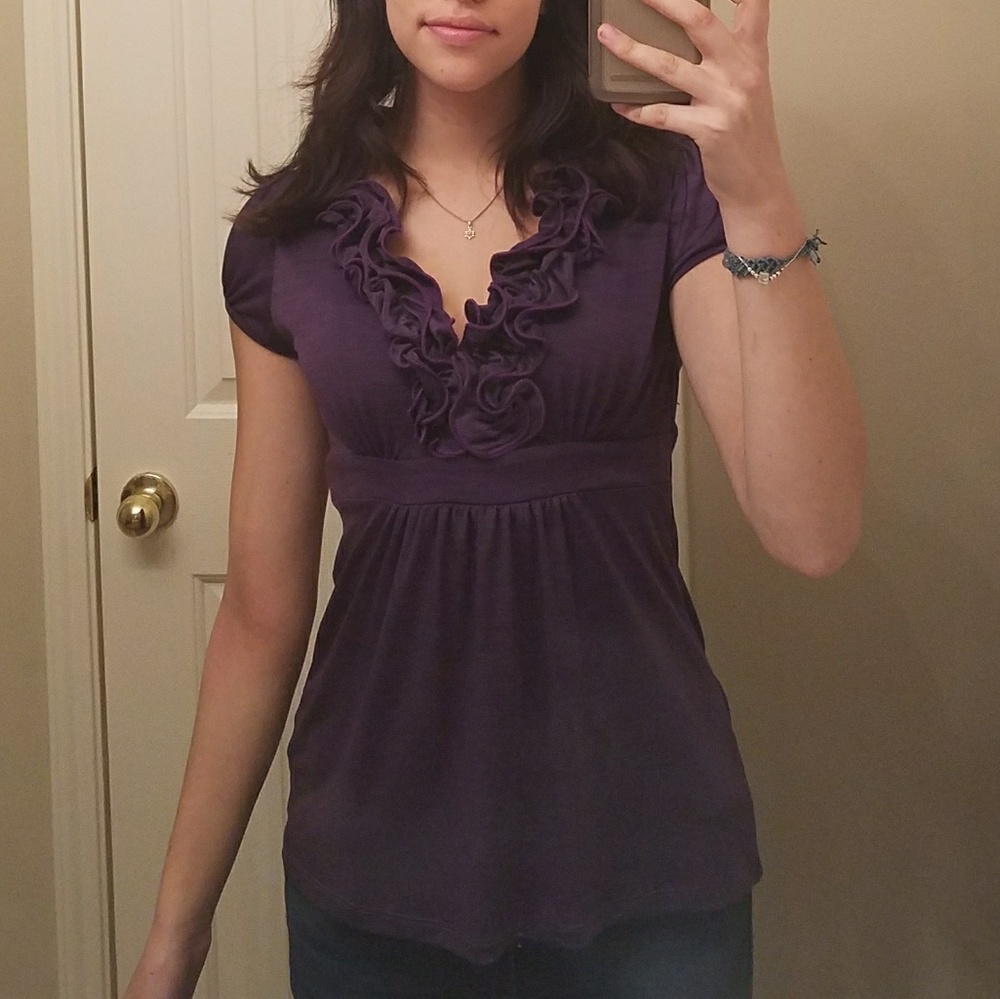 Purple top with ruffle details